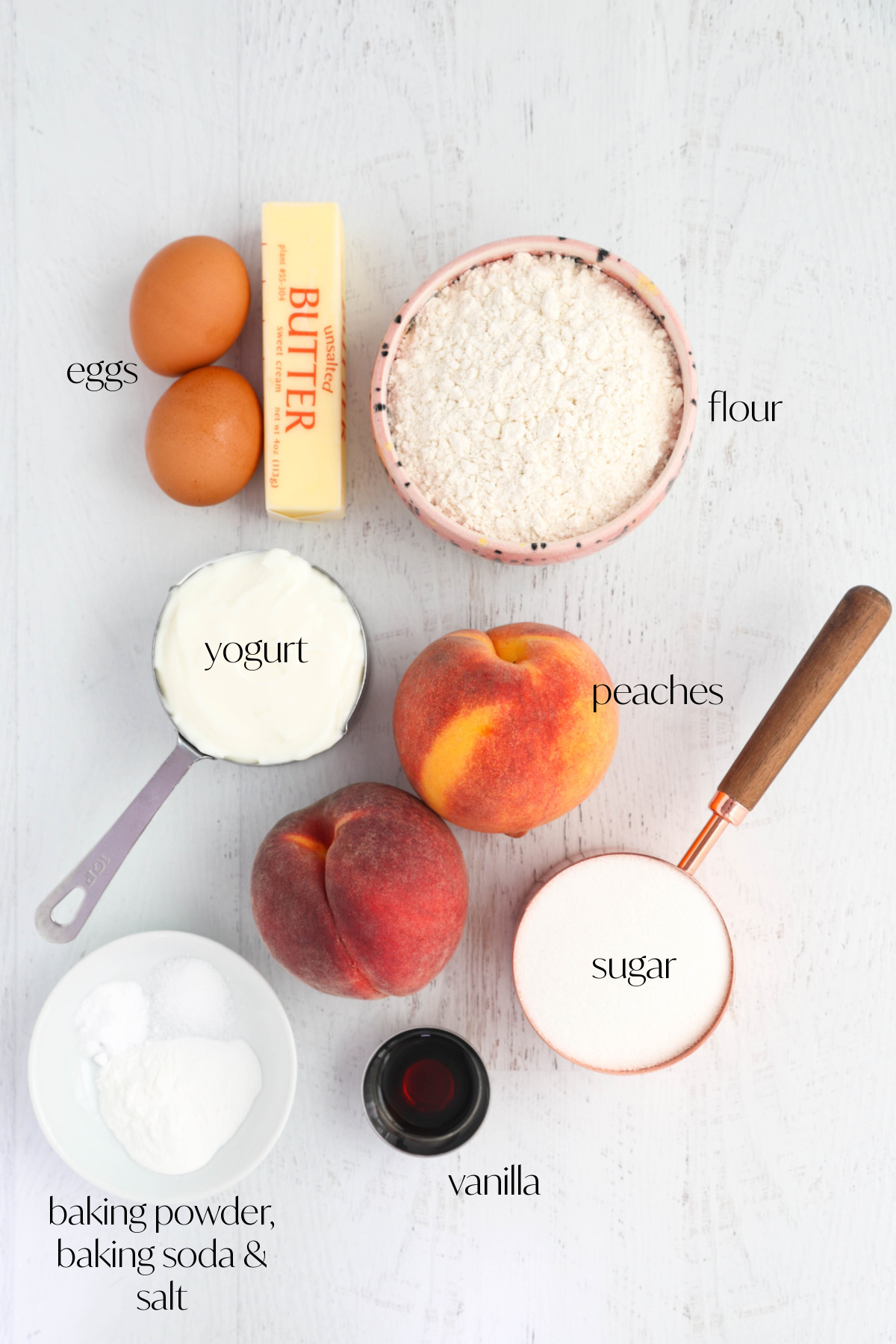 Ingredients for muffins on a light background.